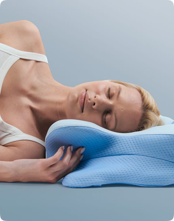 Person sleeping on their side on the SmoothSleep pillow